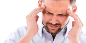 Man experiencing chronic migraine