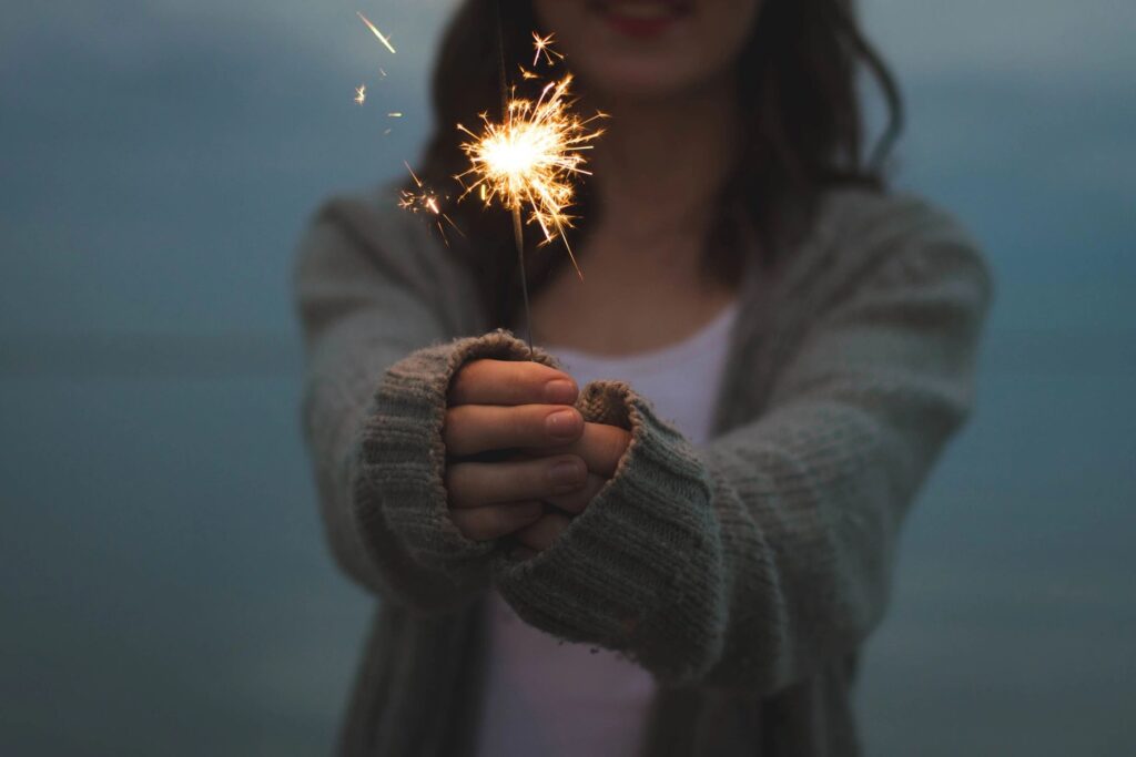 Girl holding sparkler