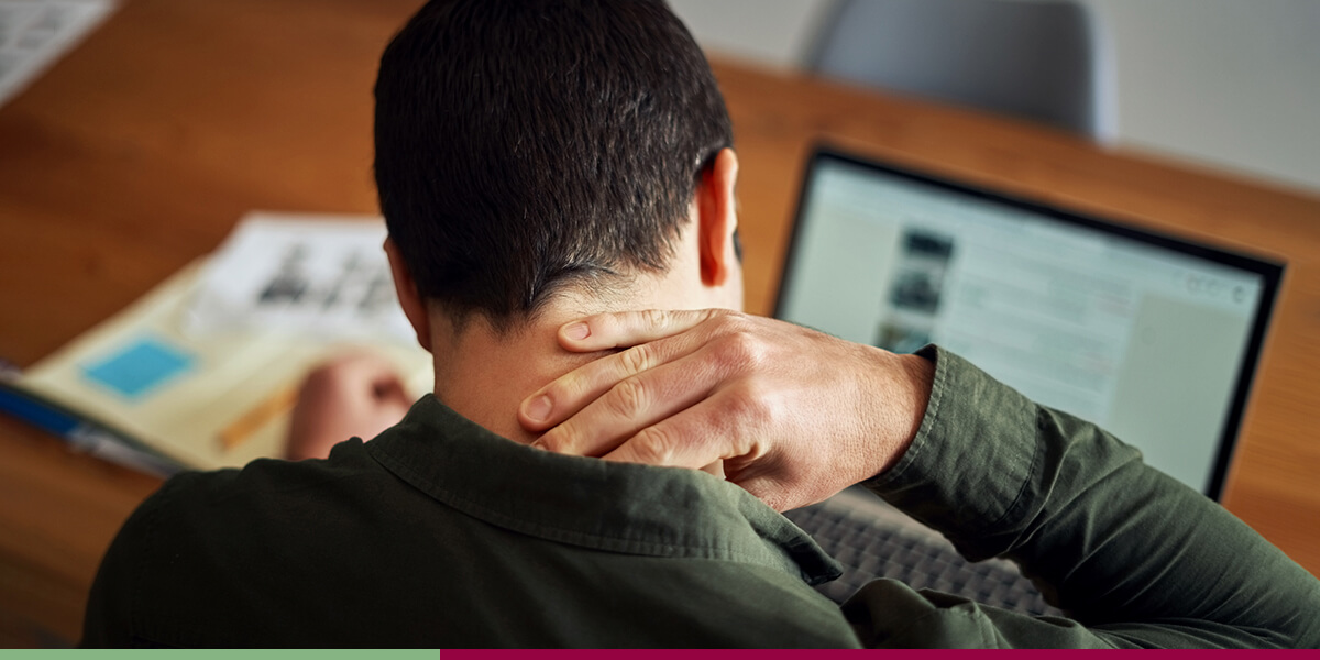 Man experiencing chronic pain located in the neck