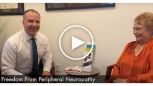 chiropractor and patient talking about neuropathy